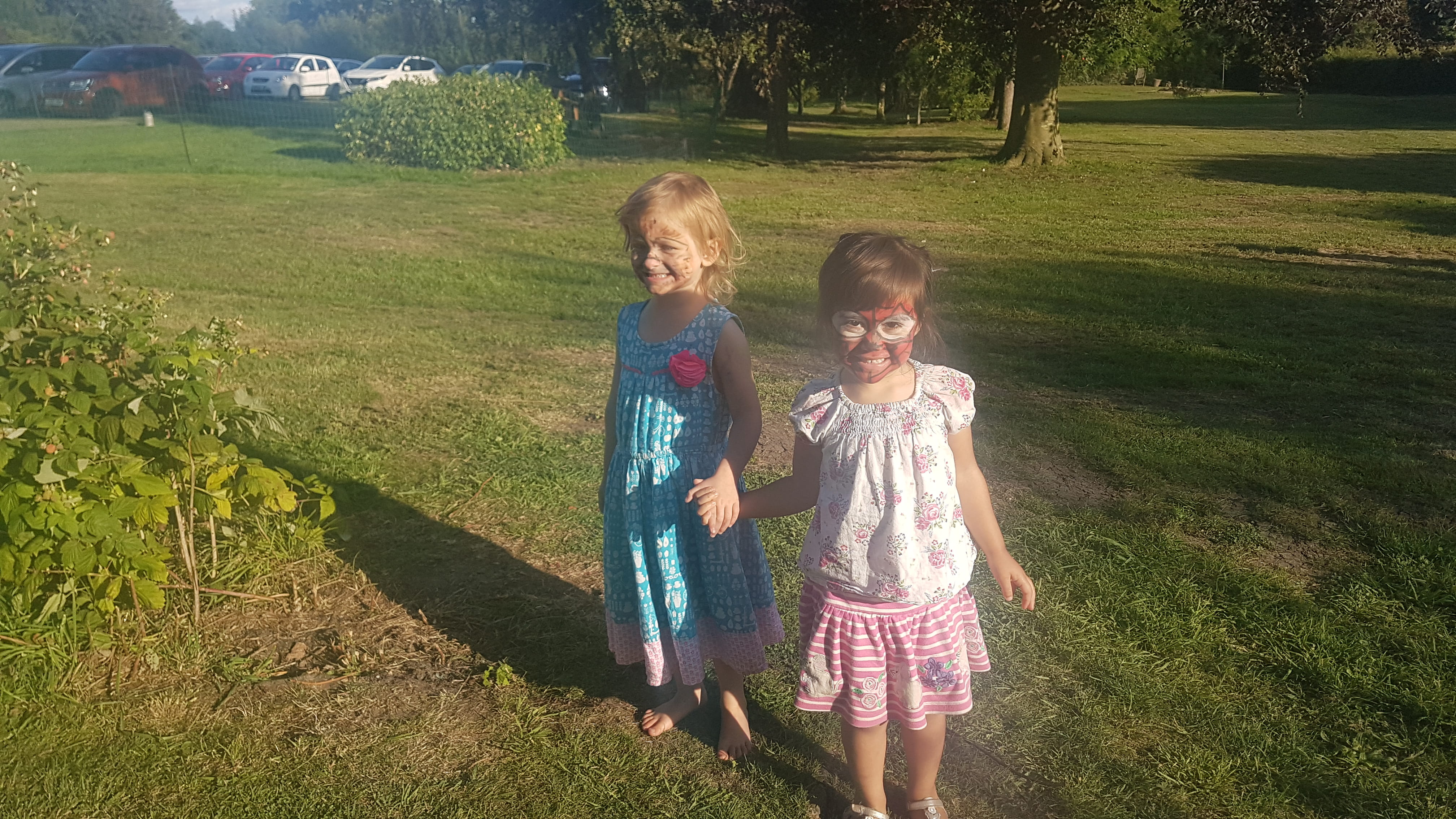 Two girls face paint